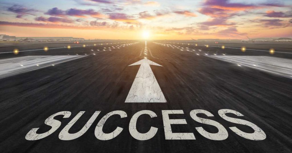 Conclusion | Pathway to Success Runway with Arrow Leading to the Word 'Success' at Sunrise