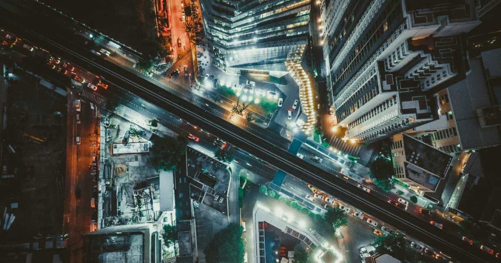 Understanding the Bangkok Market | Nighttime Aerial View Aerial View of Bangkok's Bustling Business District at Night